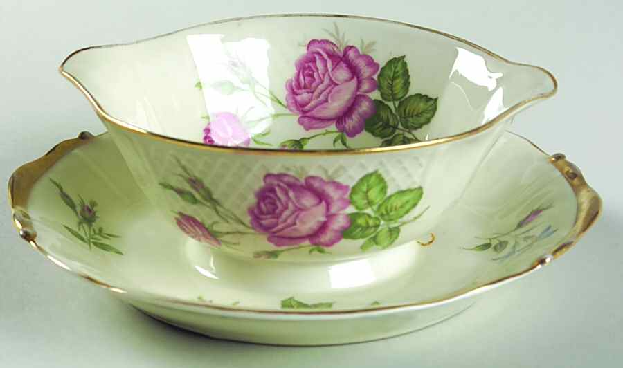 19566 Gravy Boat with Attached Underplate by Bernardaud-1
