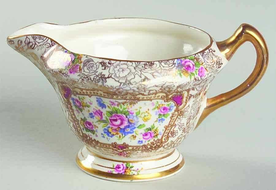 Pompadour (England) Creamer by James Kent (England)-1
