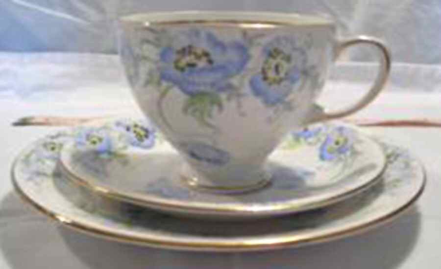 Poppy Footed Cup & Saucer Set by Samuel Radford-1