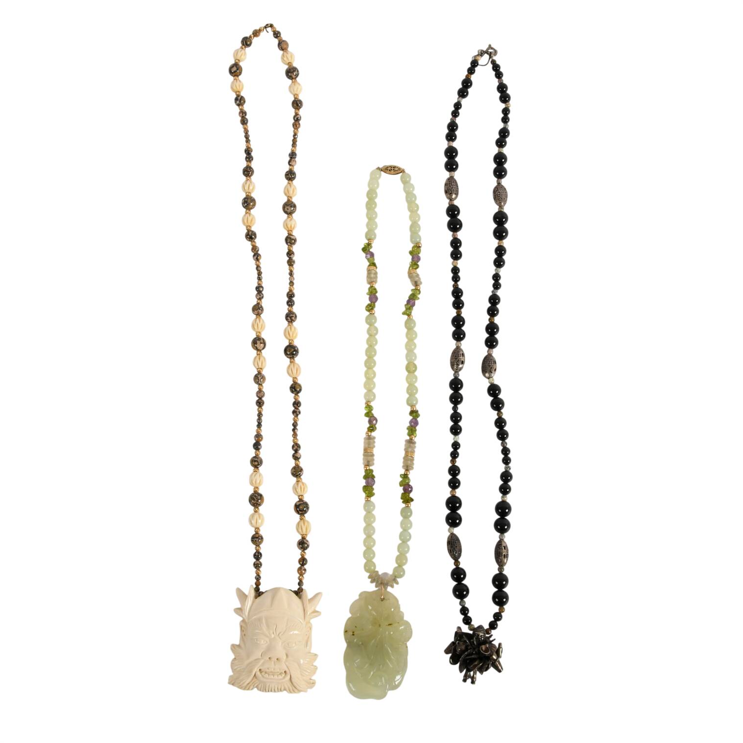 Trio of Stone, Metal, and Bone Necklaces