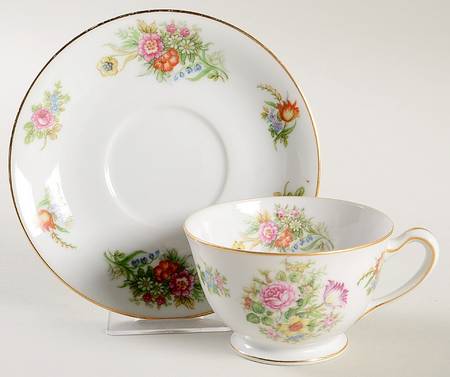 AIC2 Footed Cup & Saucer Set