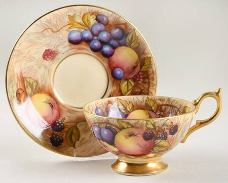 1037 Footed Cup & Saucer Set