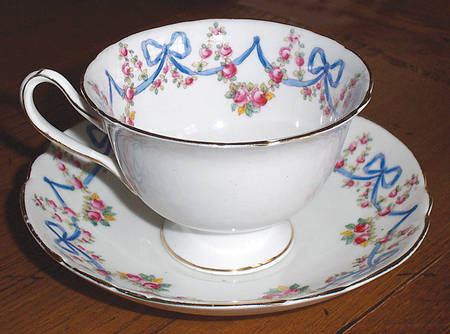 1875 Footed Cup & Saucer Set
