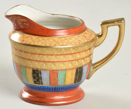 Thousand Faces Creamer