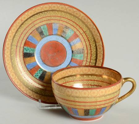 Thousand Faces Flat Cup & Saucer Set
