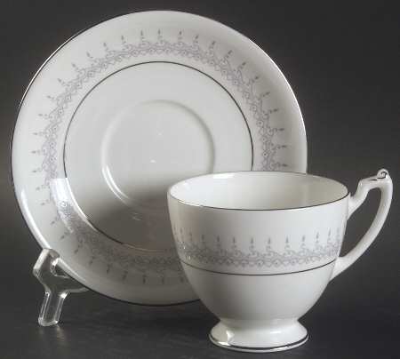 Avon Footed Cup & Saucer Set