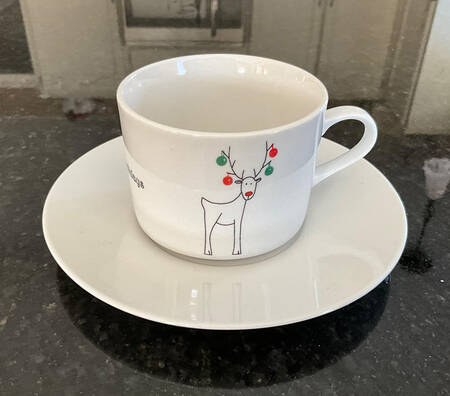 Happy Holidays (Rudy) Flat Cup & Saucer Set