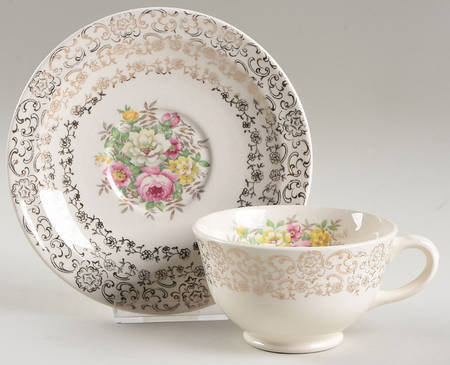 Old Lace Footed Cup & Saucer Set