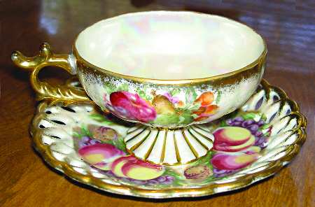 1975 Footed Cup & Saucer Set