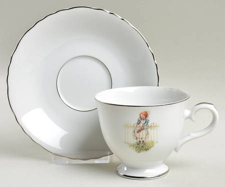 Girl with Rose Footed Cup & Saucer Set