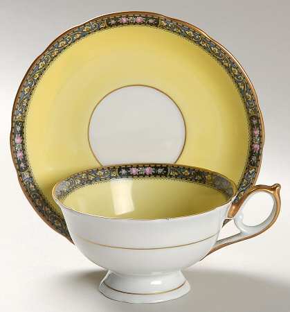 1883 Footed Cup & Saucer Set
