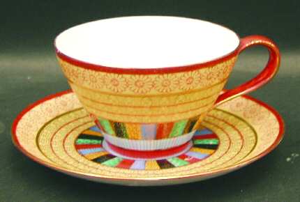 Thousand Faces Flat Cup & Saucer Set