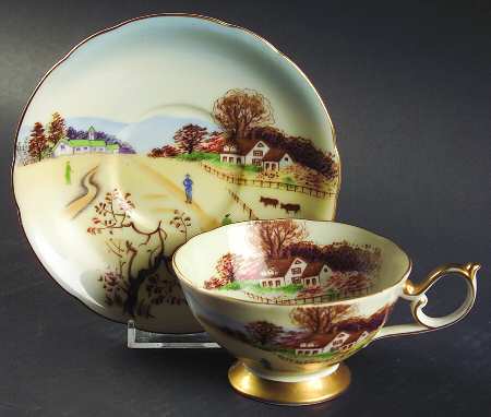 Four Seasons Footed Cup & Saucer Set