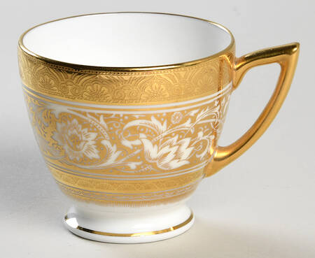 Porcelain Ball Ivory Footed Demitasse Cup