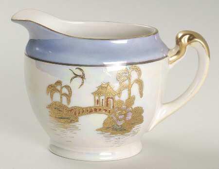 N2450 Creamer