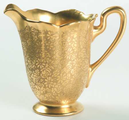 Rose and Daisy Creamer by Pickard