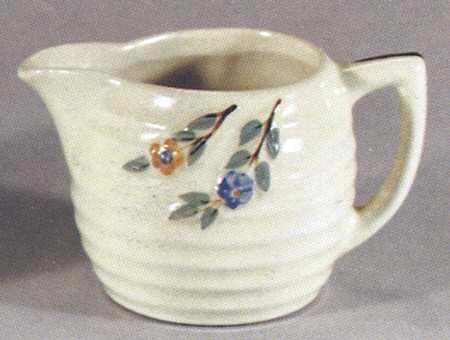 Beehive Floral Spray Creamer by Porcelier