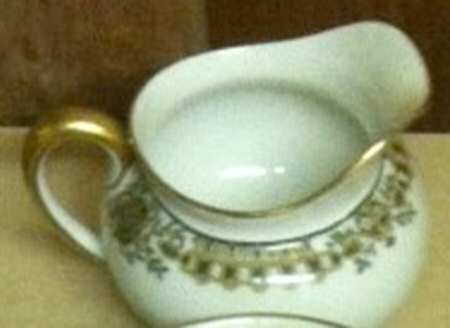 POY7 Creamer