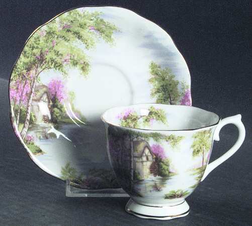 The Old Mill Footed Cup & Saucer Set