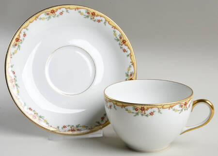 The Meuse (Rust & Yellow Flowers, Tan) Flat Cup & Saucer Set