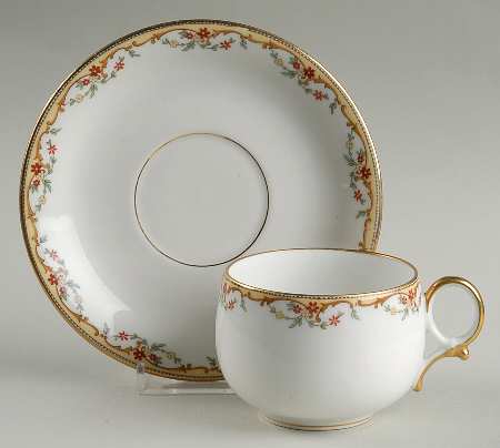 The Meuse (Rust & Yellow Flowers, Tan) Flat Cup & Saucer Set