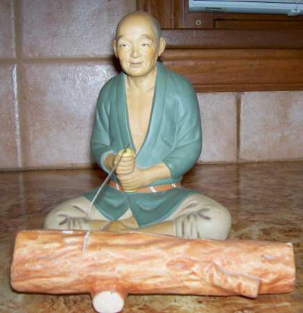 Hakata Urasaki Figurine Man Cutting Wood - No Box