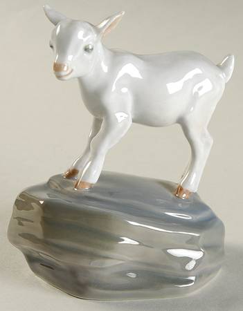 Animals-Farm and Domestic Kid On Rock - No Box