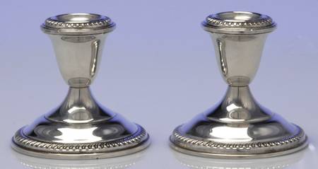 44 (Sterling, Hollowware) Pair of Weighted Candleholders