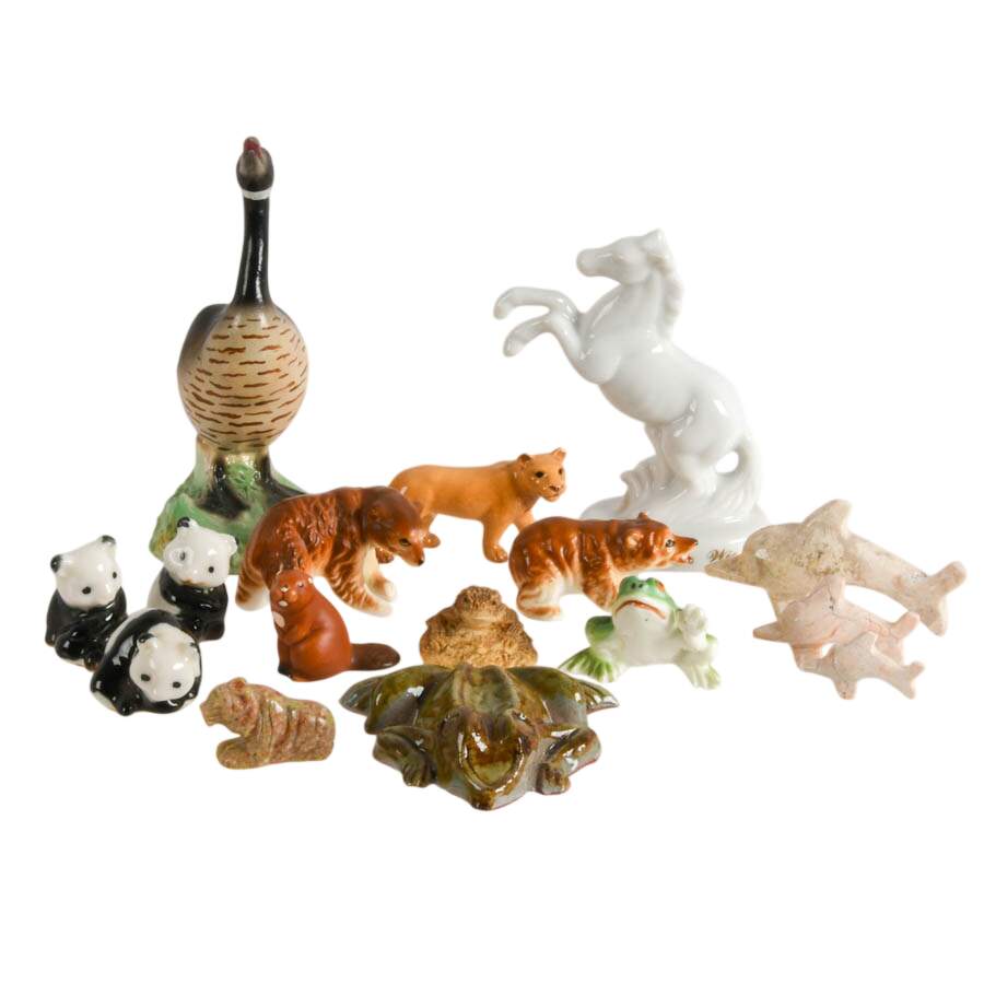 A Collection of Sixteen-Piece Miniature Zoo Animal Figurines-1