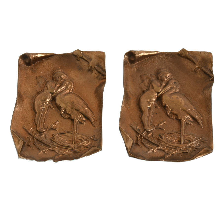Pair of Brass Plates of a Cherub and Stork-1