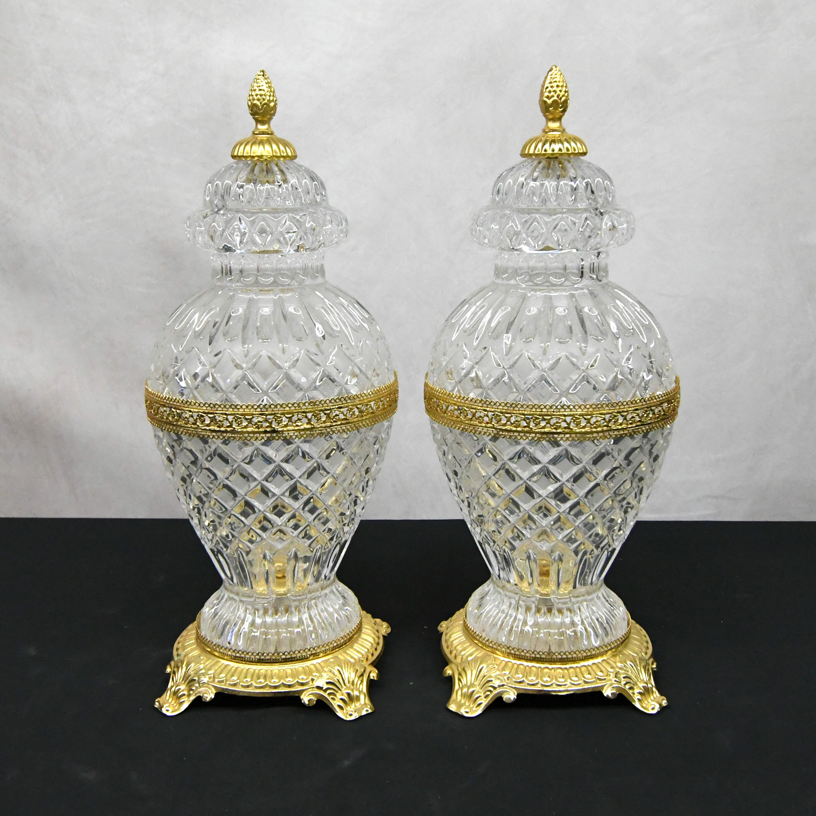 Pair of Molded Frosted Glass Lidded Urns on Gold Footed Bases-1