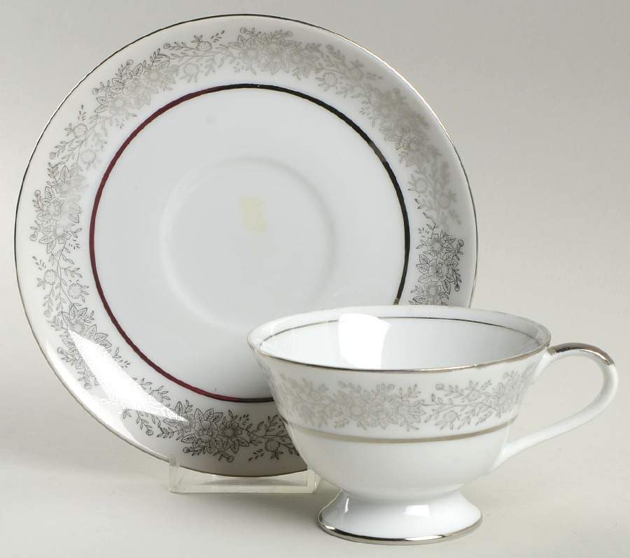 Filigree Footed Cup & Saucer Set by Arlen-1