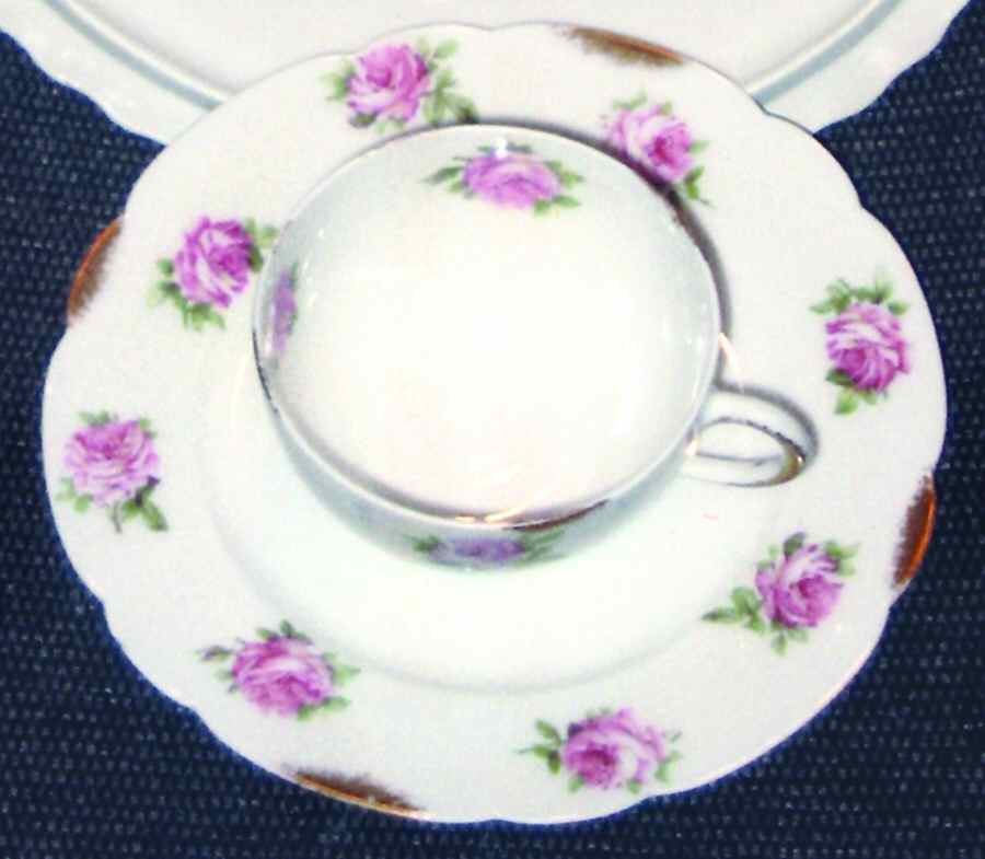 AHR663 Footed Cup & Saucer Set by Charles Ahrenfeldt-1