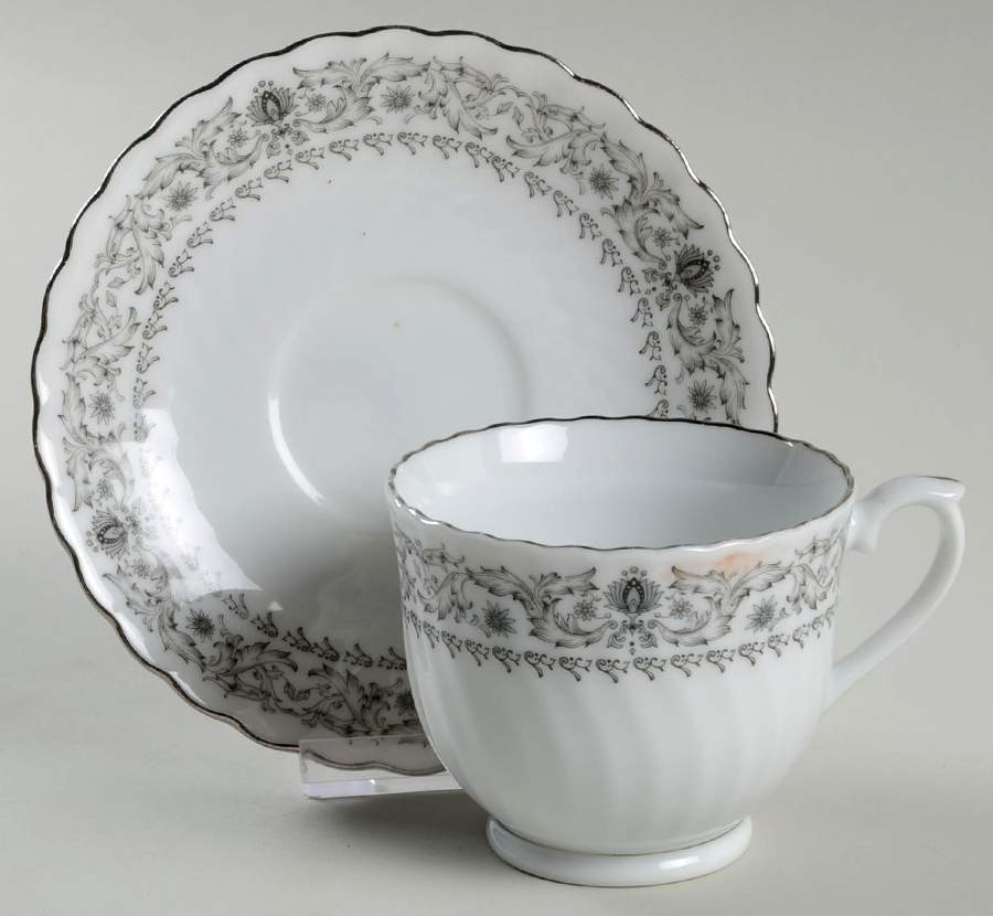 CX123 Footed Cup & Saucer Set by China (Made in China)-1