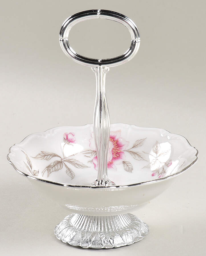 Clairmont 6"-7" Handled Footed Nut Dish HC by Edelstein-1