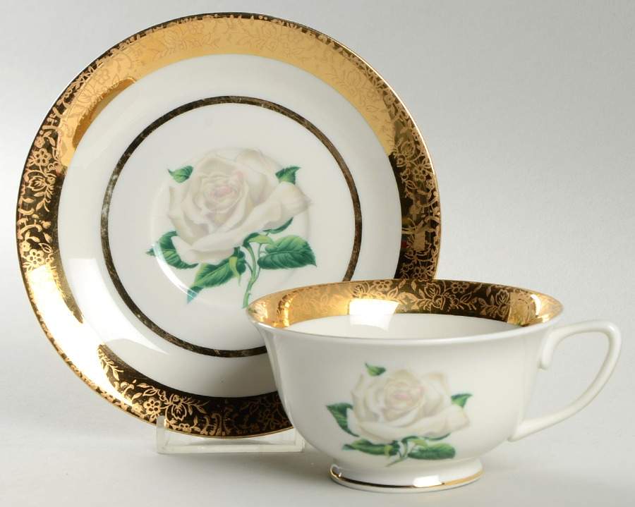 EMB50 Footed Cup & Saucer Set by Embassy (American)-1
