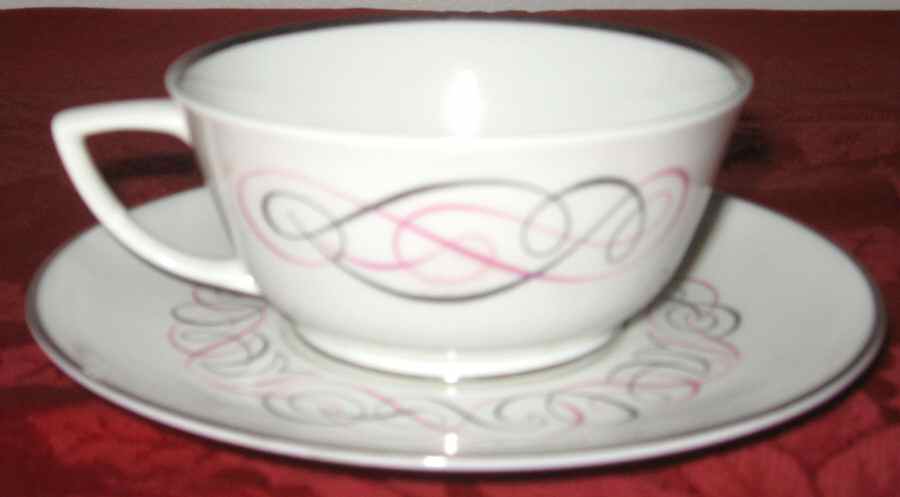 Exc5 Footed Cup & Saucer Set by Exclusive-1