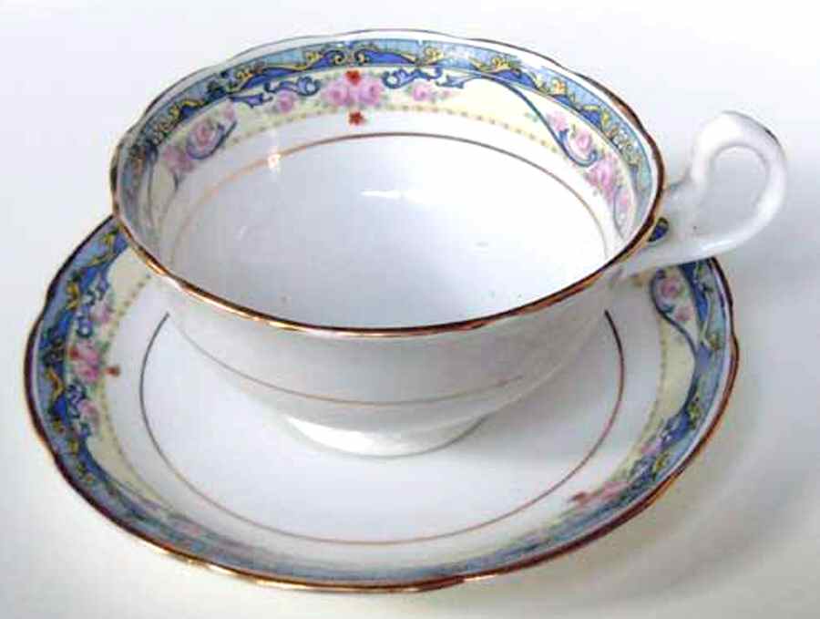 1516 Footed Cup & Saucer Set by England-1
