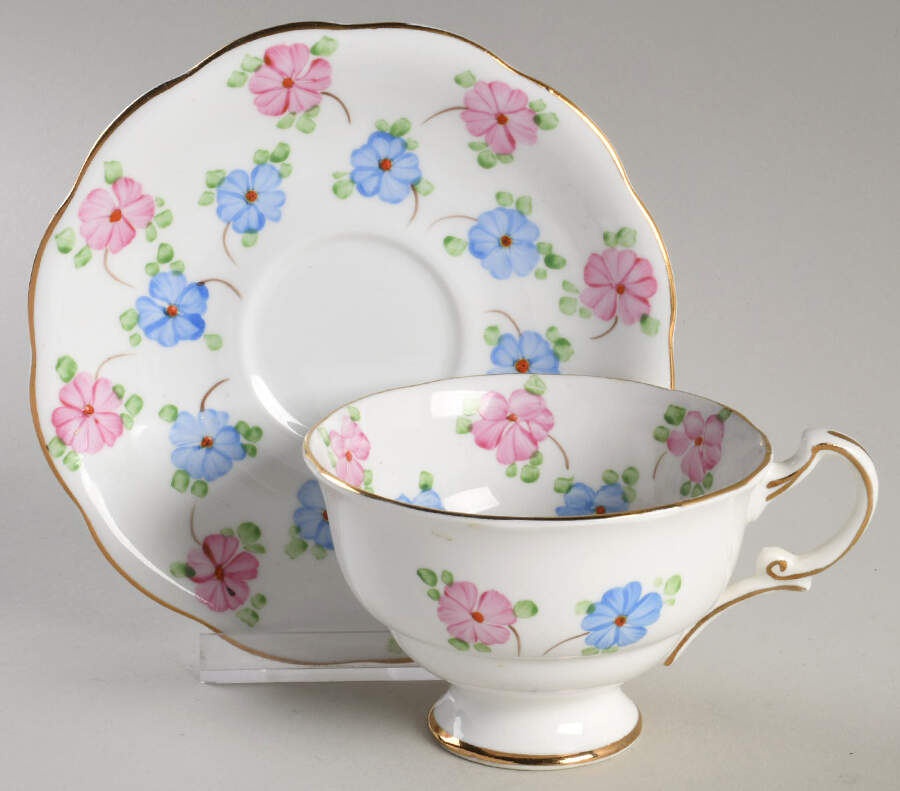 538 Footed Cup & Saucer Set by England-1