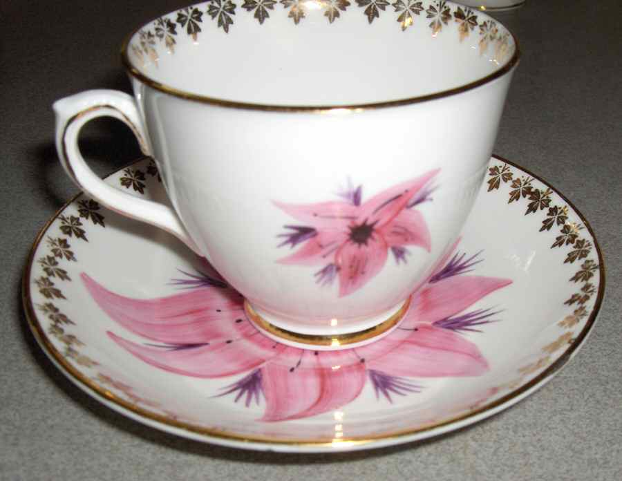 Exotic Footed Cup & Saucer Set by Thomas Forester & Sons-1