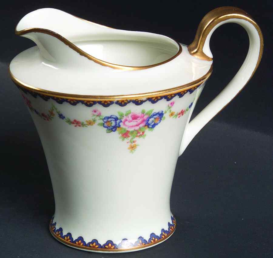 H330 (Yellow Rim, White Center) Creamer by Haviland-1