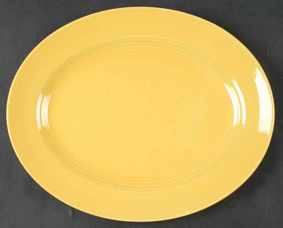 Harlequin Yellow (Older) 13" Oval Serving Platter by Homer Laughlin -1