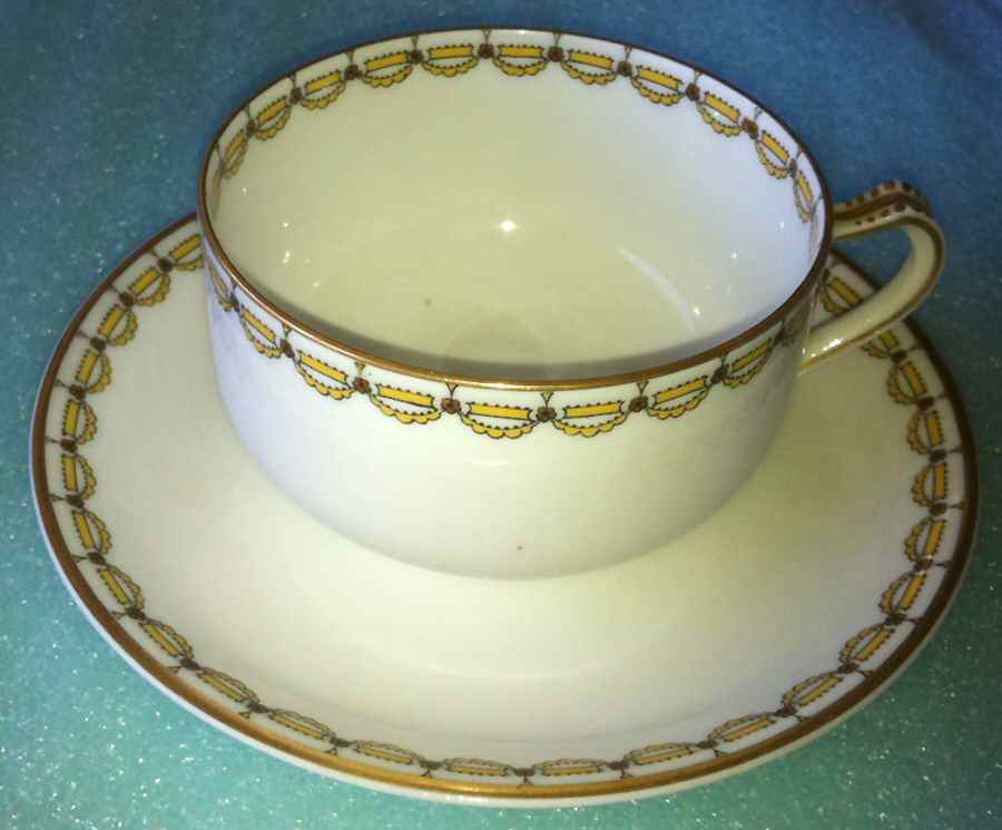 H3269 Yellow Flat Cup & Saucer Set by Haviland-1