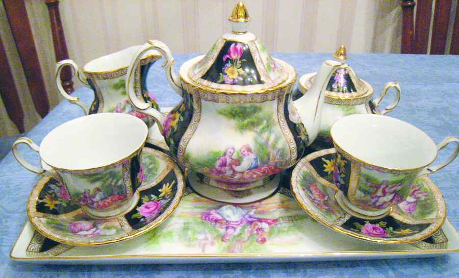 CX947 Footed Cup & Saucer Set by China (Made in China)-1
