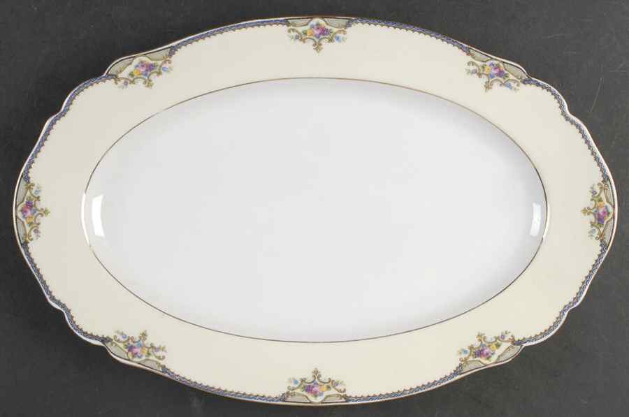 The Minto (Rim) 14" Oval Serving Platter by Paul Muller-1