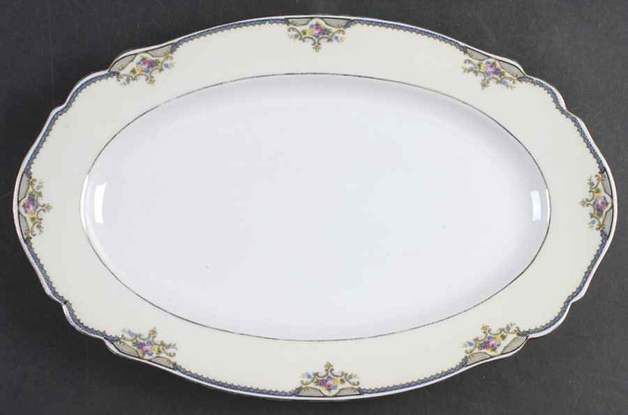The Minto (Rim) 13" Oval Serving Platter by Paul Muller-1