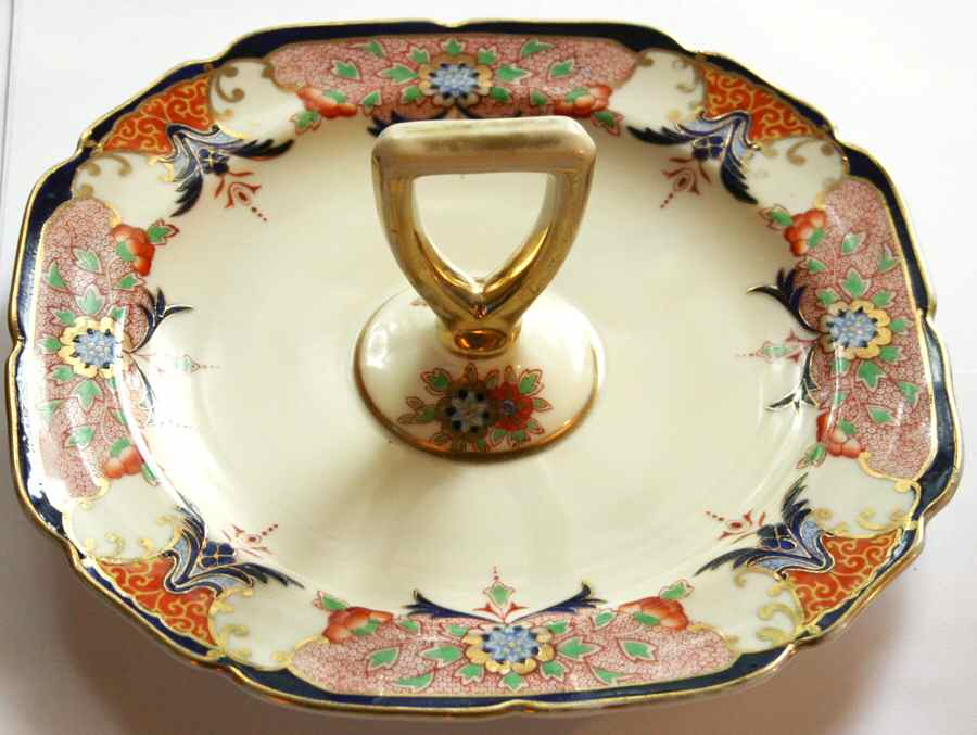 Crowndalia Round Serving Plate with Handle (DP) by Noritake-1
