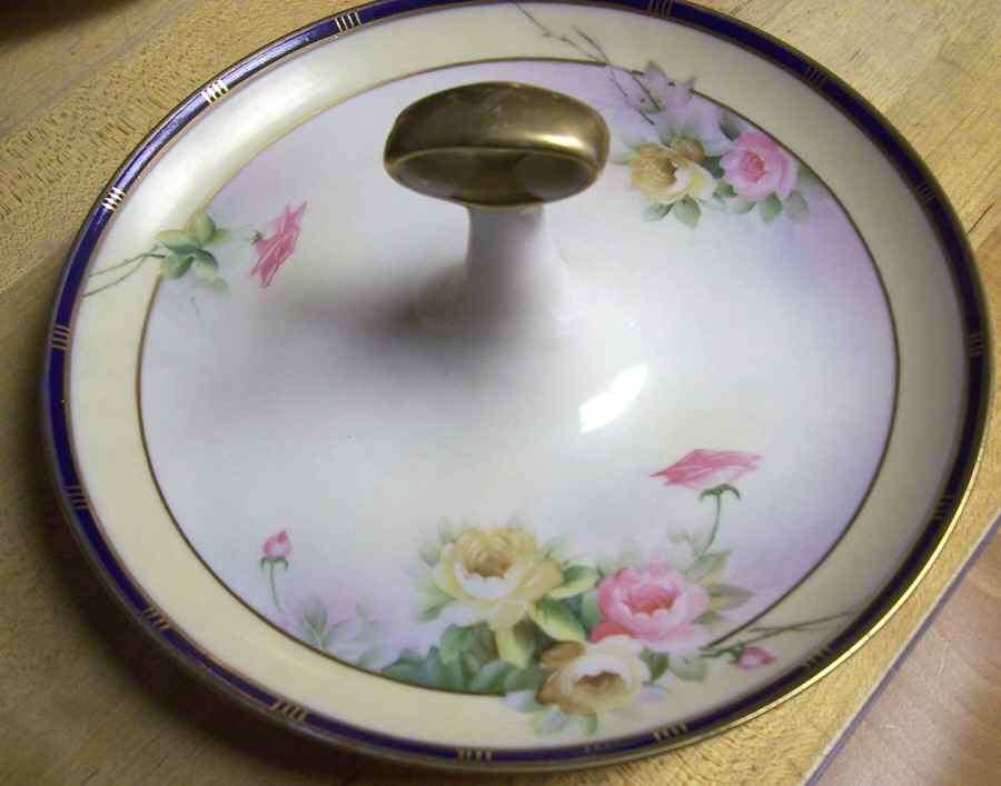 N3865 Round Serving Plate with Handle (DP) by Noritake-1