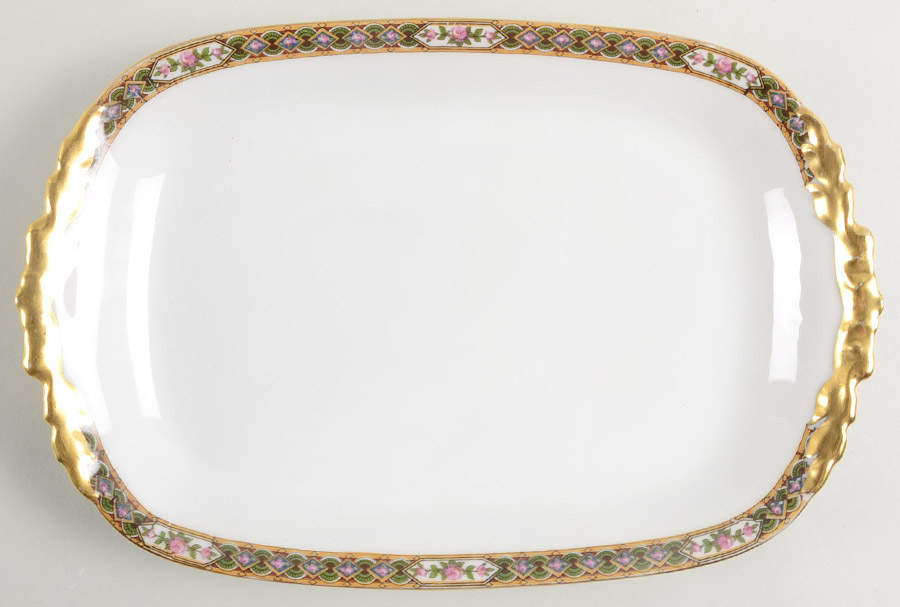 POY28 11" Oval Serving Platter by Jean Pouyat-1