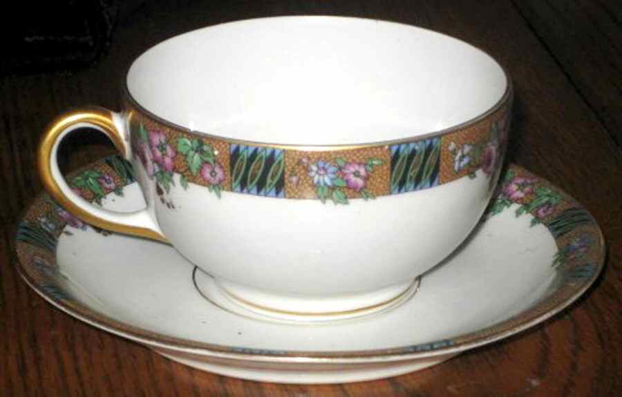 POY133 Flat Cup & Saucer Set by Jean Pouyat-1
